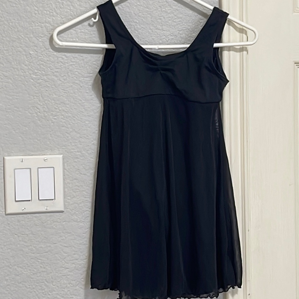 Capezio ballet leotard with attached overdress. Keyhole back. Child size Medium